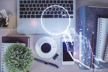 Multi exposure of creative drawing over table with phone. Top view. Concept of startup.