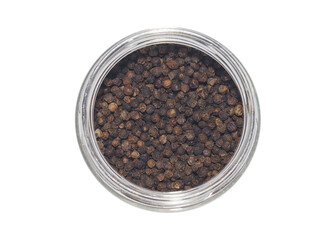 Obraz na płótnie Canvas Black pepper in a round transparent glass jar. View from above. Isolated on white background. Condiments and spices.