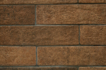 Brickwork is beige, yellow. Background, texture, tile.