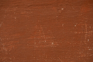 Orange scratched surface, wall. background, texture