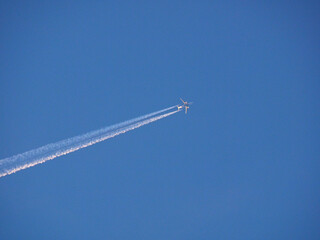 Airplane in the evening sky. The tail of the plane. Russia, Perm Territory, Elovo