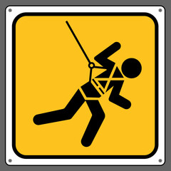 Please wear a safety harness to prevent falls from a height.Caution sign.
