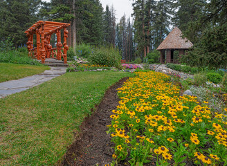 View of a gazebo and bridge in the Cascade public gardens in Banff, Alberta, Canada