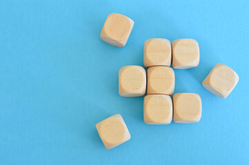 Wooden cube blocks isolated on a blue background