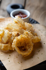 Fried crispy onion rings and sauce