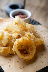 Fried crispy onion rings and sauce