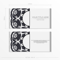 Luxurious postcard in white with abstract ornament. Vector design of invitation card with mandala patterns.