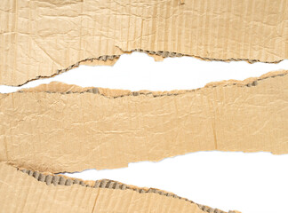 Recycled paper craft stick on a white background. Brown paper torn or ripped pieces of paper isolated on white background.
