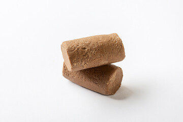 chocolate candies for tea on a white background for insulation