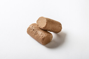 chocolate candies for tea on a white background for insulation