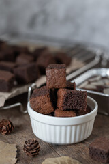 close up Chocolate brownie cake, dessert with milk on a dark background on a wooden table.