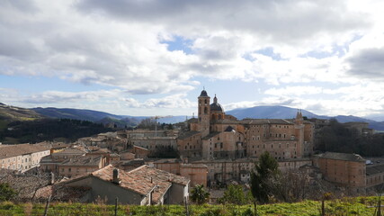 Fototapeta premium Panoramic view of the Ducal Palace of Urbino medieval walled town and university in Marche, Italy a popular travel destination