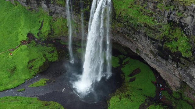 Seljalandsfoss waterfall in iceland. Aerial drone video of Icelandic landscape. Famous tourist attractions and landmarks destinations in Icelandic nature on Iceland. 4K UHD video.

