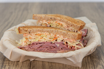 Pastrami sandwich loaded with all the good fixings to completely fill any appetite for a meal