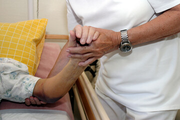 Caring for an elderly woman at a nursing home