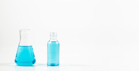 science experiment flask on white background,Glass erlenmeyer flask with glass rod isolated on...