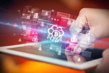 Close-up of a hand using tablet, currency concept