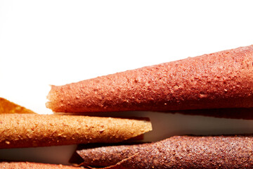 Close up of delicious fruit lozenge different colors with juicy berries on white background. Concept of healthy assorted dried sweet fruit for snacks.