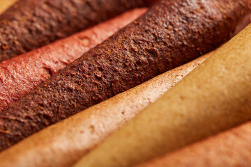 Close up of natural fruit and berries lozenge different colors on white background. Concept of natural sweets from tasty berries and for healthy snacks.