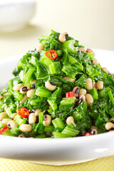 Delicious Chinese dish, stir-fried mustard greens with rice and beans