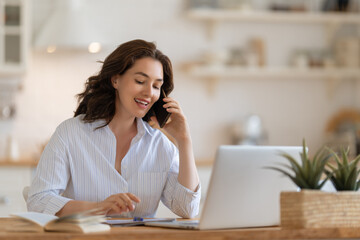 young woman working at home