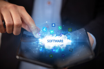 Businessman holding a foldable smartphone, technology concept