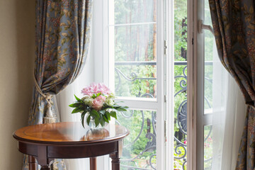 bouquet in vintage interior on background window