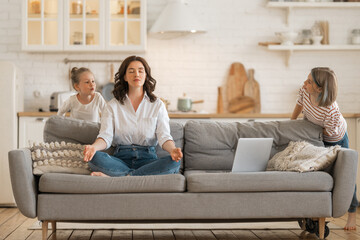 Woman meditating at home