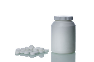 White jar for medicines and a slide of tablets. Medicines, tablets, biological supplements. Isolated.