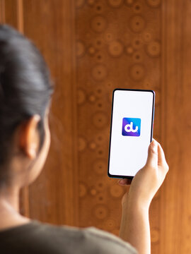 Assam, india - May 04, 2021 : Du network logo on phone screen stock image.