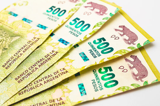 Money, Argentine Peso - ARS. Argentine money banknotes isolated on white in closeup photography. 500 pesos.
