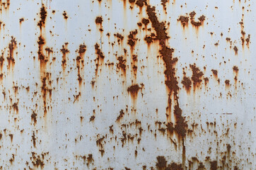 Old peeling paint. Rusty metal. Rust texture. Painted iron.
