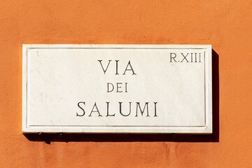 Street name via del salumi - engl: sausage street - painted at the wall in Rome