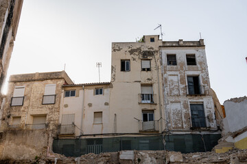 Blocks of houses in danger of collapse, old and dilapidated houses. 