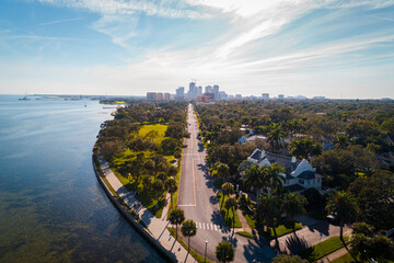 Aerial shot over the scenic road where the ocean meets Downtown Saint Petersburg, Florida.