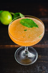 Old Cuban Cocktail Made with Rum, Mint, and Sparkling Wine: A cocktail made with dark rum and...
