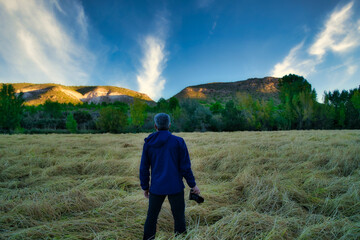 photographer in landscape of rice fields in calasparra, murcia.