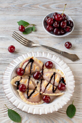 Dumplings with cherries for breakfast.