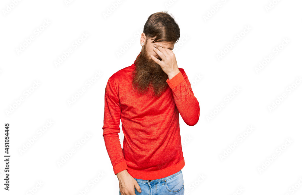 Poster redhead man with long beard wearing casual clothes tired rubbing nose and eyes feeling fatigue and h