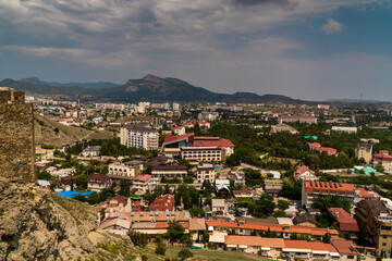 Fototapeta na wymiar The Republic of Crimea. July 12, 2021. A picturesque view of the city of Sudak from the height of the Genoese fortress.