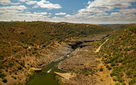 Cascata do Pulo do Lobo in Portugal, Algarve, near Mertola city, waterfall on the river Guadiana, beautiful landscape, aerial photo