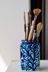 Set of brushes used for painting canvases