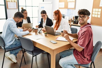 Group of business workers smiling happy working at the office