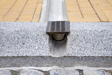 Drainage grate system, grill for removal of rainwater from stone walking paths through ditch and...