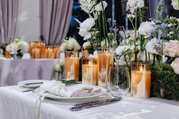 Romantic Wedding Table Top Layout Decor with large lush floral bouquets including white roses, ranunculus, persian buttercups, white orchids and candles