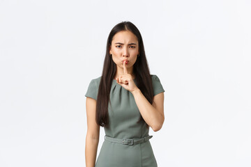 Small business owners, women entrepreneurs concept. Strict serious-looking hushing, say shh and...