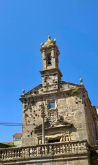 Fototapeta na wymiar Campanario de una iglesia en Galicia