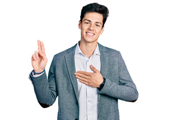 Young hispanic man wearing business clothes smiling swearing with hand on chest and fingers up,...