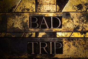 Bad Trip text message on textured grunge copper and vintage gold background