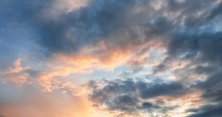 Naklejka na ściany i meble Sunset or sunrise, sky nature background with multicolored clouds
